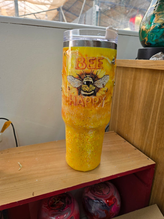 40oz Bee tumbler with bees and bumpy Junk for sensory touch and it glows